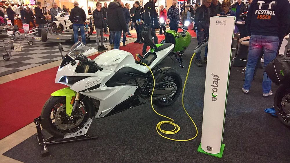 1200px-Electric_motorcycles_stand_at_the
