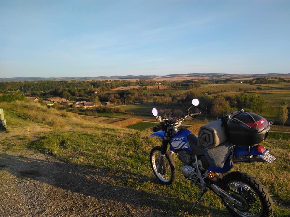 Image may contain: motorcycle, sky, outdoor and nature